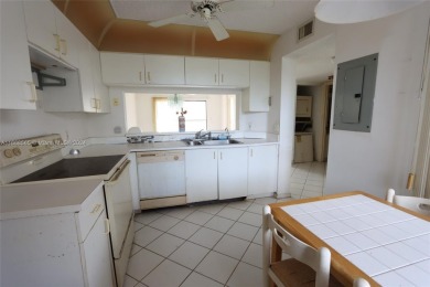 The Best in Sunrise Lakes, Phase IV. Needs a little TLC. 2/2 on Sunrise Lakes Phase IV Golf Course in Florida - for sale on GolfHomes.com, golf home, golf lot