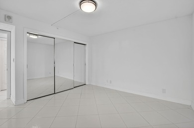 Penthouse Two Bedroom Two Bath unit with endless lake and golf on The Country Club At Boca Raton in Florida - for sale on GolfHomes.com, golf home, golf lot