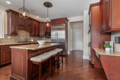 A truly breathtaking all-brick estate offering 4 bedrooms and 3 on Hawthorn Woods Country Club in Illinois - for sale on GolfHomes.com, golf home, golf lot