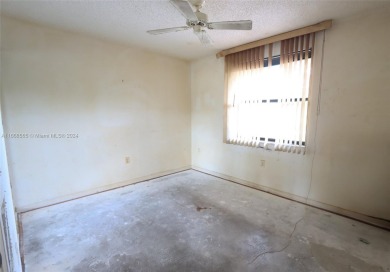 The Best in Sunrise Lakes, Phase IV. Needs a little TLC. 2/2 on Sunrise Lakes Phase IV Golf Course in Florida - for sale on GolfHomes.com, golf home, golf lot