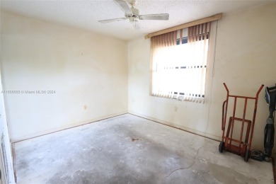 The Best in Sunrise Lakes, Phase IV. Needs a little TLC. 2/2 on Sunrise Lakes Phase IV Golf Course in Florida - for sale on GolfHomes.com, golf home, golf lot