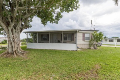 Welcome to this BEAUTIFUL, meticulously maintained manufactured on Davie Golf Club in Florida - for sale on GolfHomes.com, golf home, golf lot