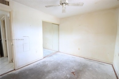 The Best in Sunrise Lakes, Phase IV. Needs a little TLC. 2/2 on Sunrise Lakes Phase IV Golf Course in Florida - for sale on GolfHomes.com, golf home, golf lot