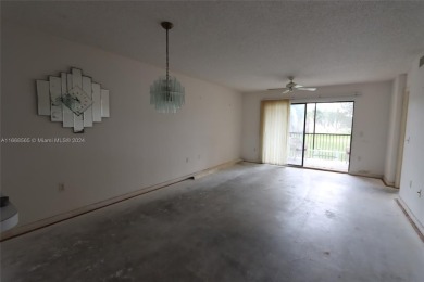 The Best in Sunrise Lakes, Phase IV. Needs a little TLC. 2/2 on Sunrise Lakes Phase IV Golf Course in Florida - for sale on GolfHomes.com, golf home, golf lot