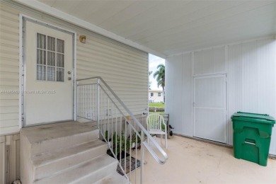 Welcome to this BEAUTIFUL, meticulously maintained manufactured on Davie Golf Club in Florida - for sale on GolfHomes.com, golf home, golf lot