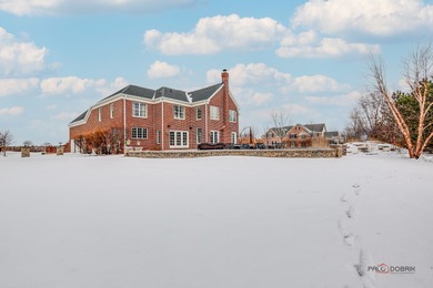 A truly breathtaking all-brick estate offering 4 bedrooms and 3 on Hawthorn Woods Country Club in Illinois - for sale on GolfHomes.com, golf home, golf lot