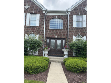 A truly breathtaking all-brick estate offering 4 bedrooms and 3 on Hawthorn Woods Country Club in Illinois - for sale on GolfHomes.com, golf home, golf lot