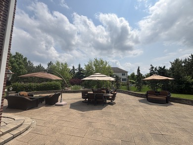 A truly breathtaking all-brick estate offering 4 bedrooms and 3 on Hawthorn Woods Country Club in Illinois - for sale on GolfHomes.com, golf home, golf lot