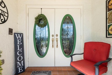 Spacious 2-bedroom, 2-bath home offering over 2,100 sq ft of on Caloosa Greens Executive Golf Course in Florida - for sale on GolfHomes.com, golf home, golf lot