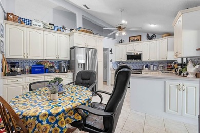 Spacious 2-bedroom, 2-bath home offering over 2,100 sq ft of on Caloosa Greens Executive Golf Course in Florida - for sale on GolfHomes.com, golf home, golf lot