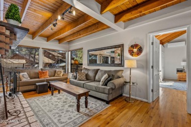 This stunning home is nestled in one of Munds Park's most on Pinewood Country Club in Arizona - for sale on GolfHomes.com, golf home, golf lot
