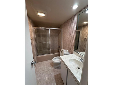 Enjoy breathtaking views of the golf course from your screened on Palm-Aire Country Club and Resort - The Oaks in Florida - for sale on GolfHomes.com, golf home, golf lot