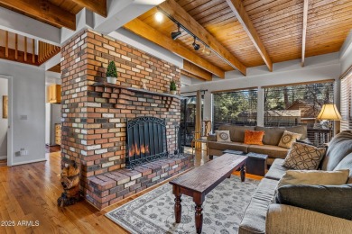 This stunning home is nestled in one of Munds Park's most on Pinewood Country Club in Arizona - for sale on GolfHomes.com, golf home, golf lot