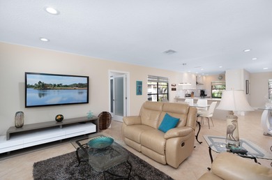 Immaculate, move-in-ready corner residence offering 3 bedrooms on Boca Lago Golf and Country Club in Florida - for sale on GolfHomes.com, golf home, golf lot