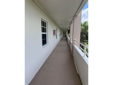 Enjoy breathtaking views of the golf course from your screened on Palm-Aire Country Club and Resort - The Oaks in Florida - for sale on GolfHomes.com, golf home, golf lot