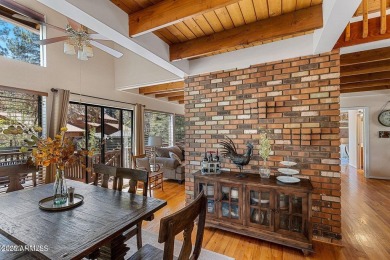 This stunning home is nestled in one of Munds Park's most on Pinewood Country Club in Arizona - for sale on GolfHomes.com, golf home, golf lot