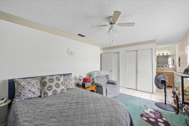 **New Waterfront Handyman Special - Your Dream Canal Home on Palm Harbor Golf Club in Florida - for sale on GolfHomes.com, golf home, golf lot