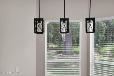 Modern Luxury Meets Smart Energy Living in Orange Park's Premier on Country Club of Orange Park in Florida - for sale on GolfHomes.com, golf home, golf lot