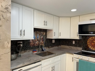 Custom kitchen with designer granite counters functional new on Kings Point Golf -Flanders Way in Florida - for sale on GolfHomes.com, golf home, golf lot