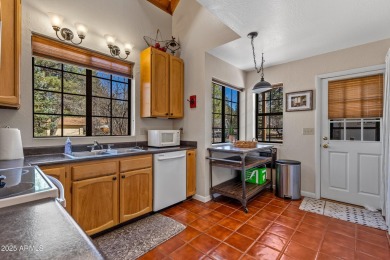 This stunning home is nestled in one of Munds Park's most on Pinewood Country Club in Arizona - for sale on GolfHomes.com, golf home, golf lot