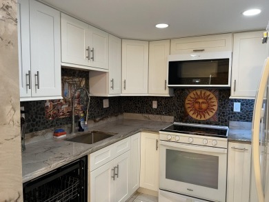 Custom kitchen with designer granite counters functional new on Kings Point Golf -Flanders Way in Florida - for sale on GolfHomes.com, golf home, golf lot