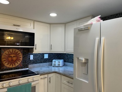 Custom kitchen with designer granite counters functional new on Kings Point Golf -Flanders Way in Florida - for sale on GolfHomes.com, golf home, golf lot
