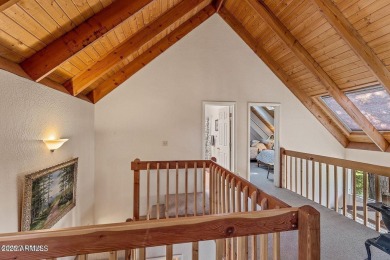 This stunning home is nestled in one of Munds Park's most on Pinewood Country Club in Arizona - for sale on GolfHomes.com, golf home, golf lot