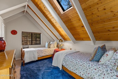 This stunning home is nestled in one of Munds Park's most on Pinewood Country Club in Arizona - for sale on GolfHomes.com, golf home, golf lot