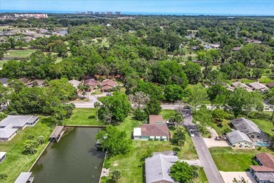 **New Waterfront Handyman Special - Your Dream Canal Home on Palm Harbor Golf Club in Florida - for sale on GolfHomes.com, golf home, golf lot
