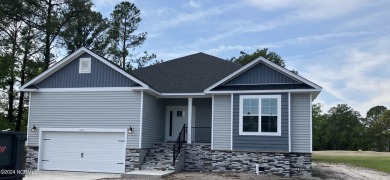 This brand-new construction beauty offers 1902 square feet of on Harbour Point Golf Club in North Carolina - for sale on GolfHomes.com, golf home, golf lot