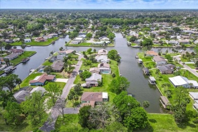 **New Waterfront Handyman Special - Your Dream Canal Home on Palm Harbor Golf Club in Florida - for sale on GolfHomes.com, golf home, golf lot