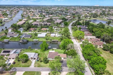**New Waterfront Handyman Special - Your Dream Canal Home on Palm Harbor Golf Club in Florida - for sale on GolfHomes.com, golf home, golf lot