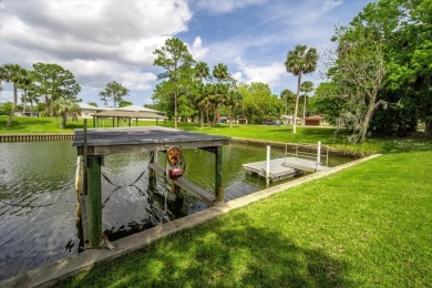 **New Waterfront Handyman Special - Your Dream Canal Home on Palm Harbor Golf Club in Florida - for sale on GolfHomes.com, golf home, golf lot