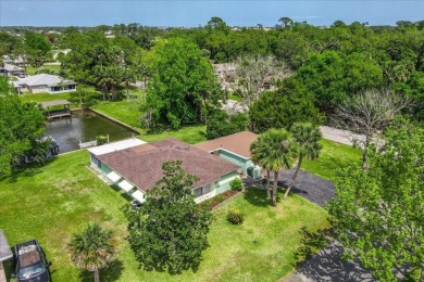 **New Waterfront Handyman Special - Your Dream Canal Home on Palm Harbor Golf Club in Florida - for sale on GolfHomes.com, golf home, golf lot