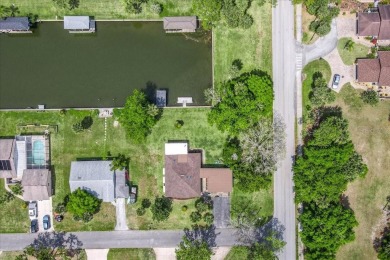 **New Waterfront Handyman Special - Your Dream Canal Home on Palm Harbor Golf Club in Florida - for sale on GolfHomes.com, golf home, golf lot