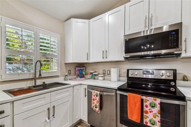 This home is located in the Forest Hills area of Tampa.  It is on Babe Zaharias Golf Course in Florida - for sale on GolfHomes.com, golf home, golf lot