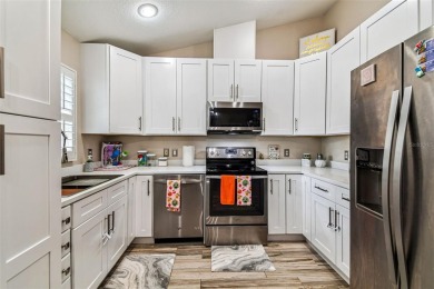 This home is located in the Forest Hills area of Tampa.  It is on Babe Zaharias Golf Course in Florida - for sale on GolfHomes.com, golf home, golf lot