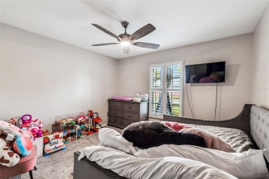 This home is located in the Forest Hills area of Tampa.  It is on Babe Zaharias Golf Course in Florida - for sale on GolfHomes.com, golf home, golf lot