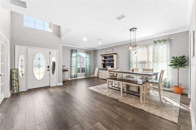 Welcome to refined living in North Shore at Lake Hart -- where on North Shore Golf Club in Florida - for sale on GolfHomes.com, golf home, golf lot