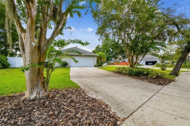 This home is located in the Forest Hills area of Tampa.  It is on Babe Zaharias Golf Course in Florida - for sale on GolfHomes.com, golf home, golf lot