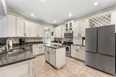 Welcome to refined living in North Shore at Lake Hart -- where on North Shore Golf Club in Florida - for sale on GolfHomes.com, golf home, golf lot