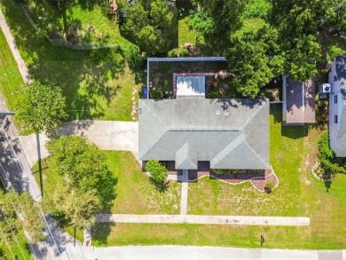 This home is located in the Forest Hills area of Tampa.  It is on Babe Zaharias Golf Course in Florida - for sale on GolfHomes.com, golf home, golf lot