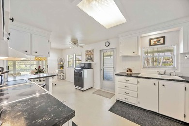 Dock and Davits Included! Welcome to 10303 Burnt Store Road #221 on Twin Isles Country Club in Florida - for sale on GolfHomes.com, golf home, golf lot