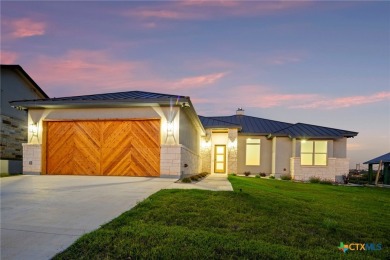 Experience refined living in this beautifully built 2022 home on Apple Rock Golf Course - Horseshoe Bay in Texas - for sale on GolfHomes.com, golf home, golf lot