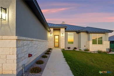 Experience refined living in this beautifully built 2022 home on Apple Rock Golf Course - Horseshoe Bay in Texas - for sale on GolfHomes.com, golf home, golf lot