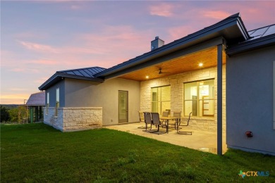 Experience refined living in this beautifully built 2022 home on Apple Rock Golf Course - Horseshoe Bay in Texas - for sale on GolfHomes.com, golf home, golf lot