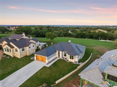Experience refined living in this beautifully built 2022 home on Apple Rock Golf Course - Horseshoe Bay in Texas - for sale on GolfHomes.com, golf home, golf lot