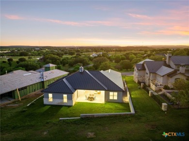 Experience refined living in this beautifully built 2022 home on Apple Rock Golf Course - Horseshoe Bay in Texas - for sale on GolfHomes.com, golf home, golf lot