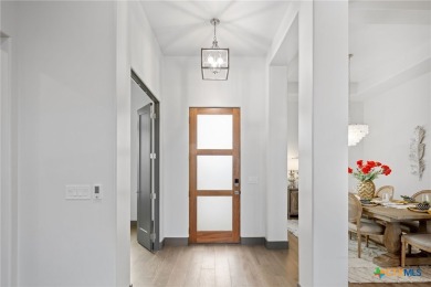 Experience refined living in this beautifully built 2022 home on Apple Rock Golf Course - Horseshoe Bay in Texas - for sale on GolfHomes.com, golf home, golf lot