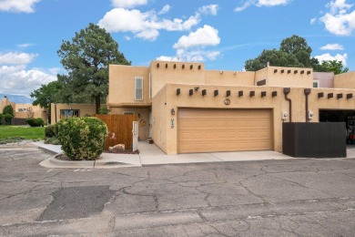 Welcome to your bright, 2-story, end-unit townhome in the Villa on Arroyo Del Oso Golf Course in New Mexico - for sale on GolfHomes.com, golf home, golf lot